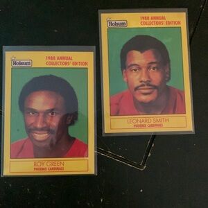 Two 1988 annual collectors’ edition trading cards, signed by the players.